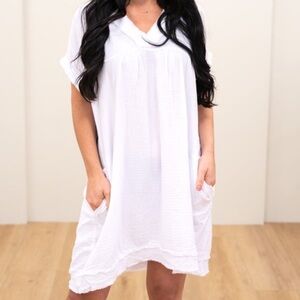 White dress/bathing suit cover up.